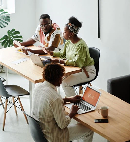 Canva - 2 Women Sitting on Chair in Front of Table_ Canva - 2 Women Sitting on Chair in Front of Table_